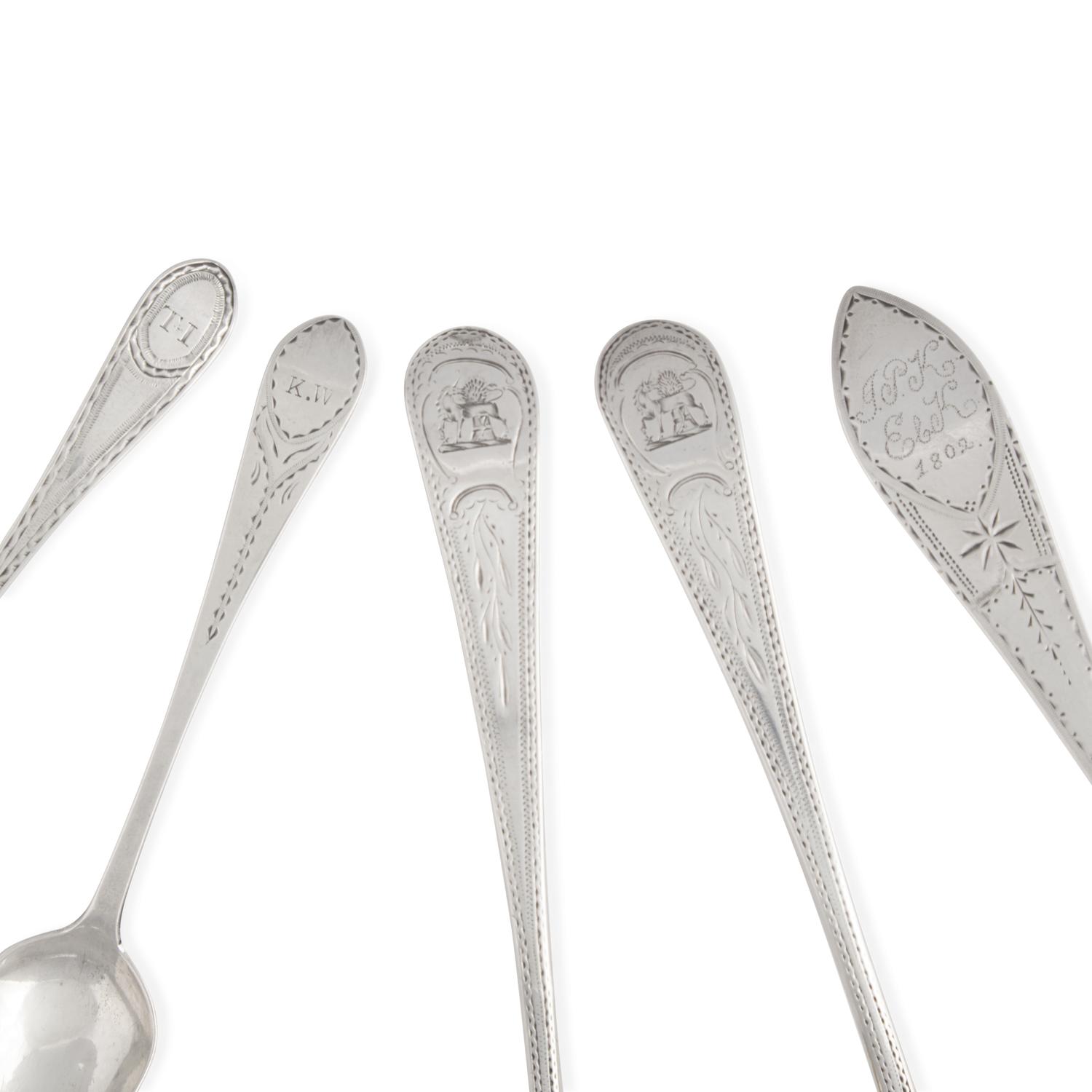 An Assorted Group of Five Silver Spoons and Sauce Ladles