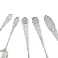 An Assorted Group of Five Silver Spoons and Sauce Ladles