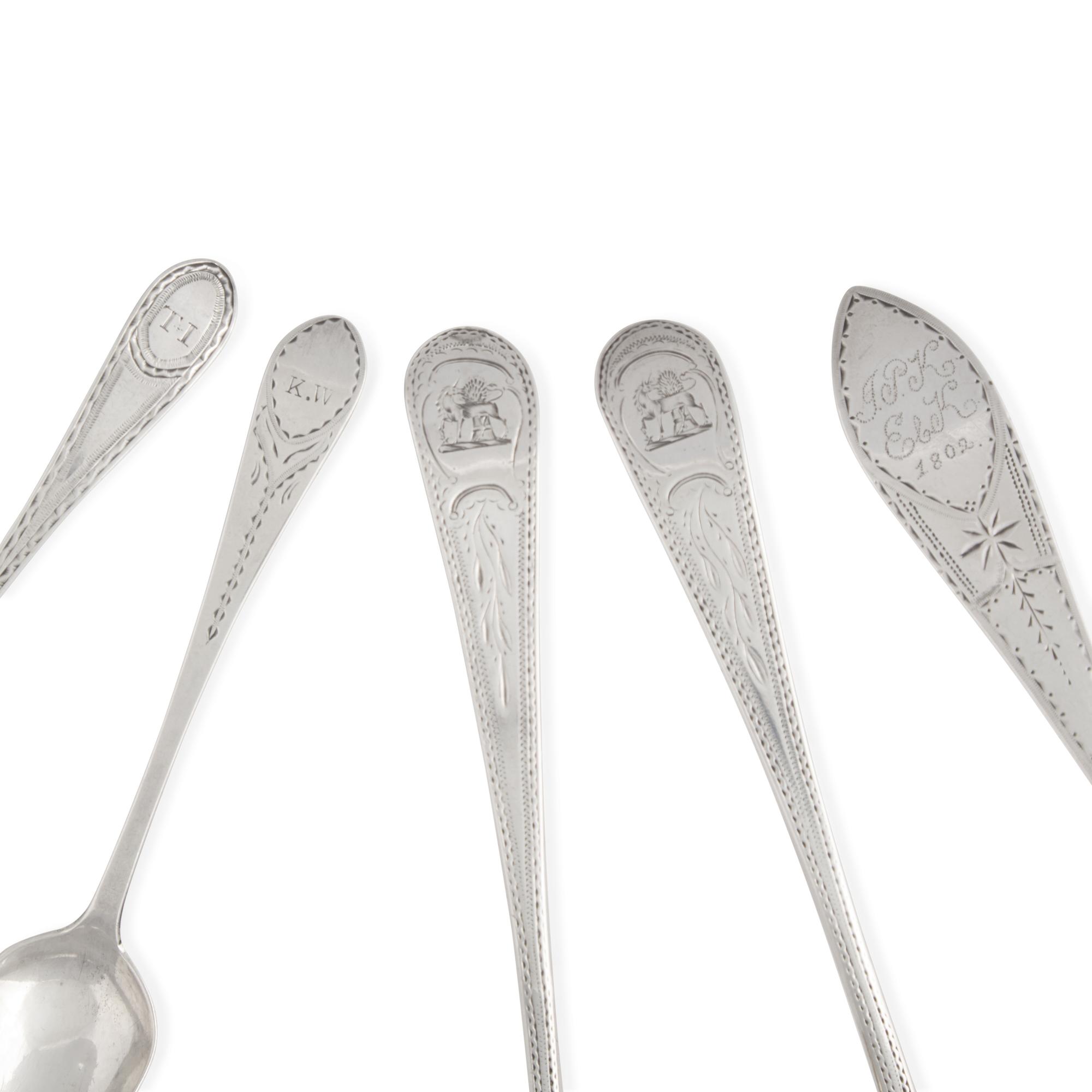 An Assorted Group of Five Silver Spoons and Sauce Ladles