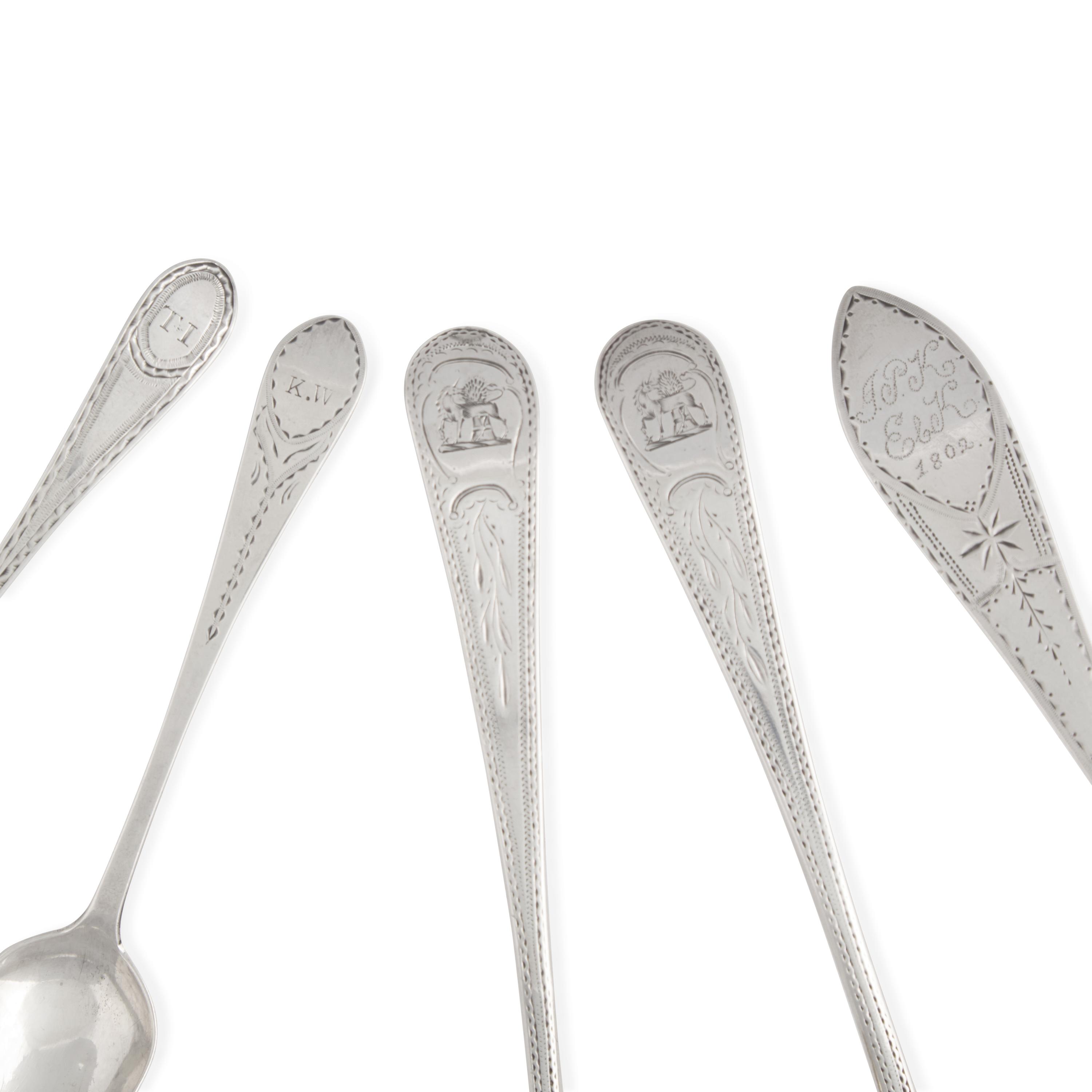 An Assorted Group of Five Silver Spoons and Sauce Ladles