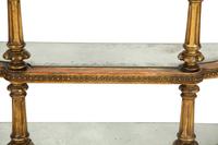 An Italian Carved and Painted Three Tier Etagere Console