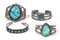 Four Southwestern Silver and Turquoise Bracelets Length of largest 5 1/4 x opening 3/4 x width 2 1/4 inches