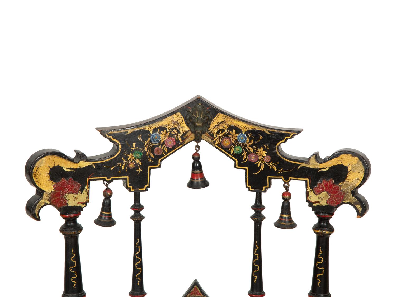 A Set of Four Black and Polychrome Chinoiserie-Decorated Chairs