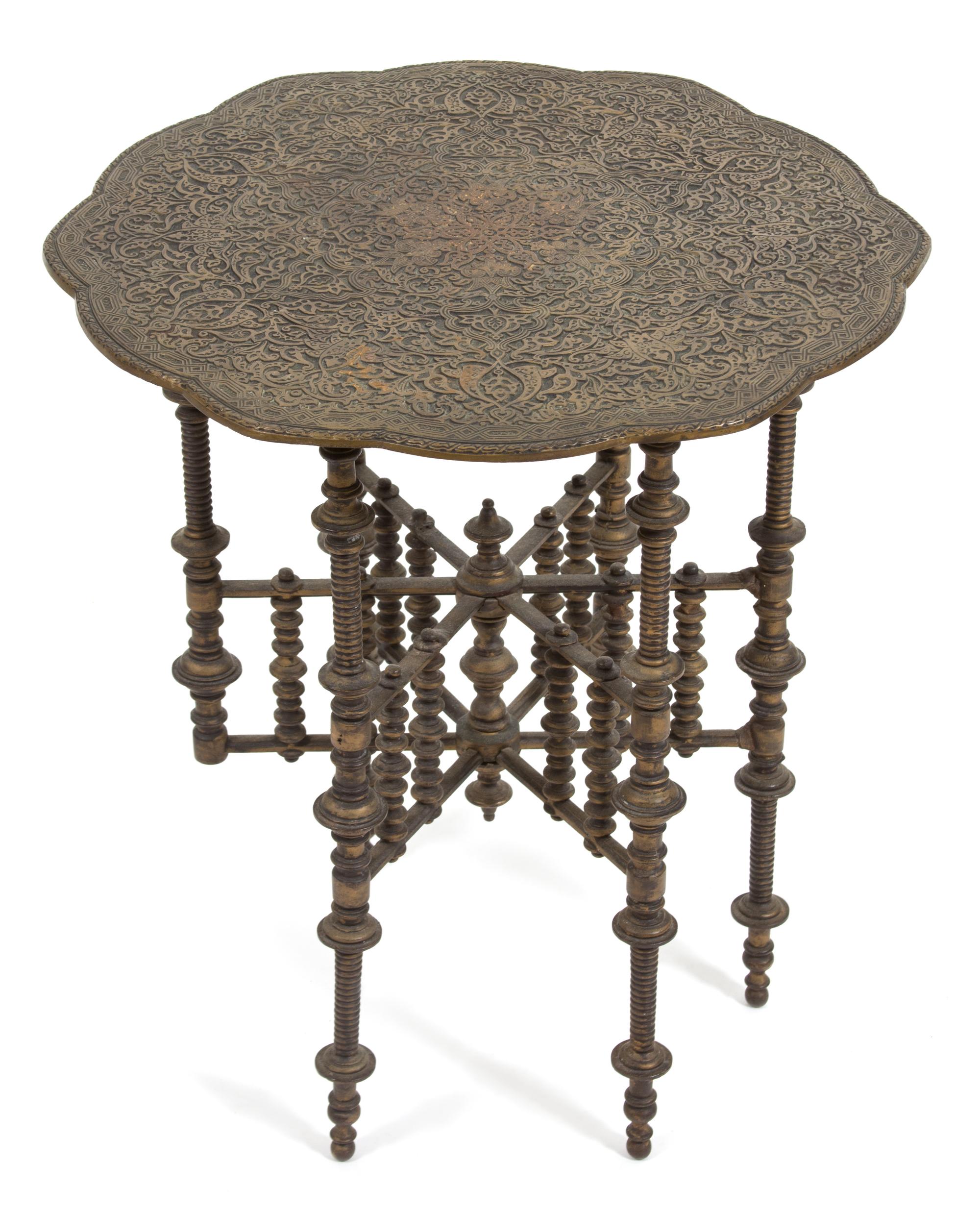 An Indian Embossed Bronze Tray Top Table