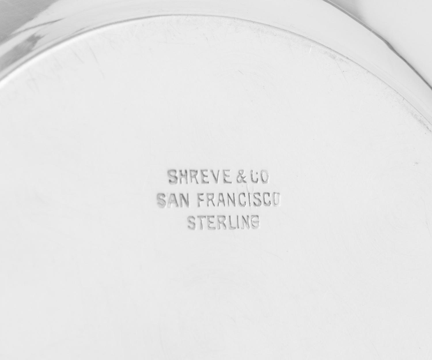 A Set of Twelve American Silver Bread Plates