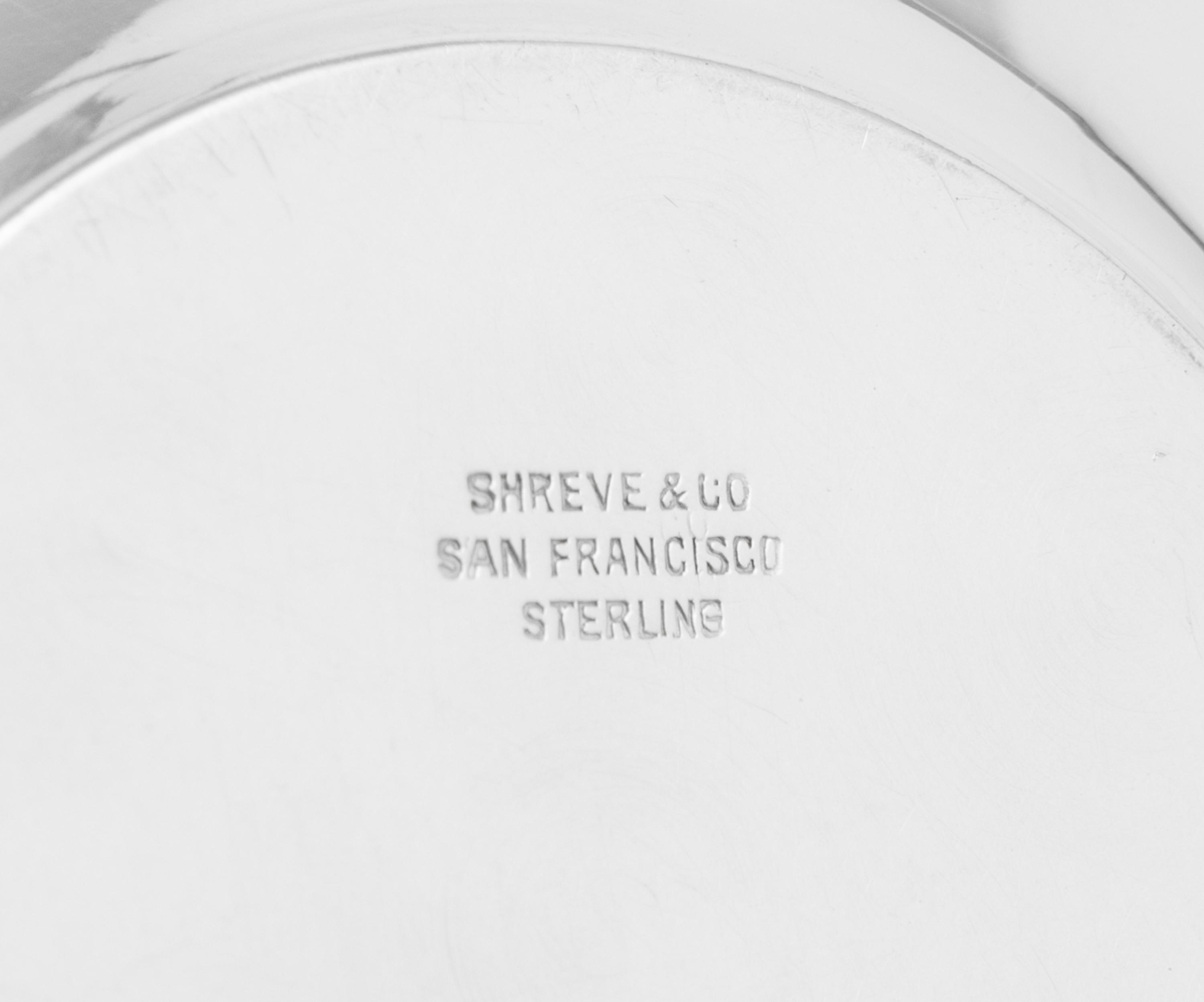 A Set of Twelve American Silver Bread Plates