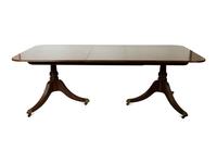A Baker George III Style Mahogany Double-Pedestal Dining Table