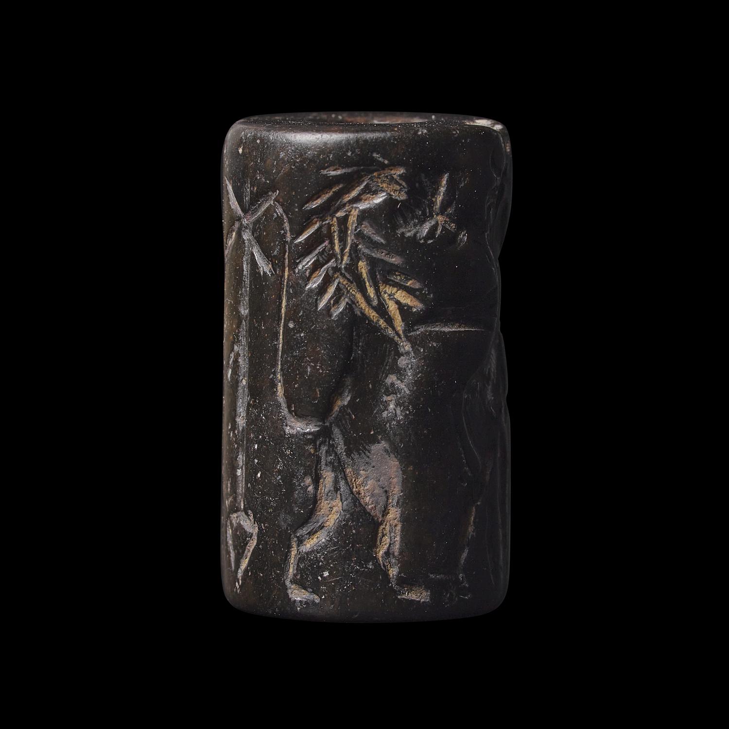 An Akkadian Hematite Cylinder Seal