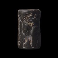 An Akkadian Hematite Cylinder Seal
