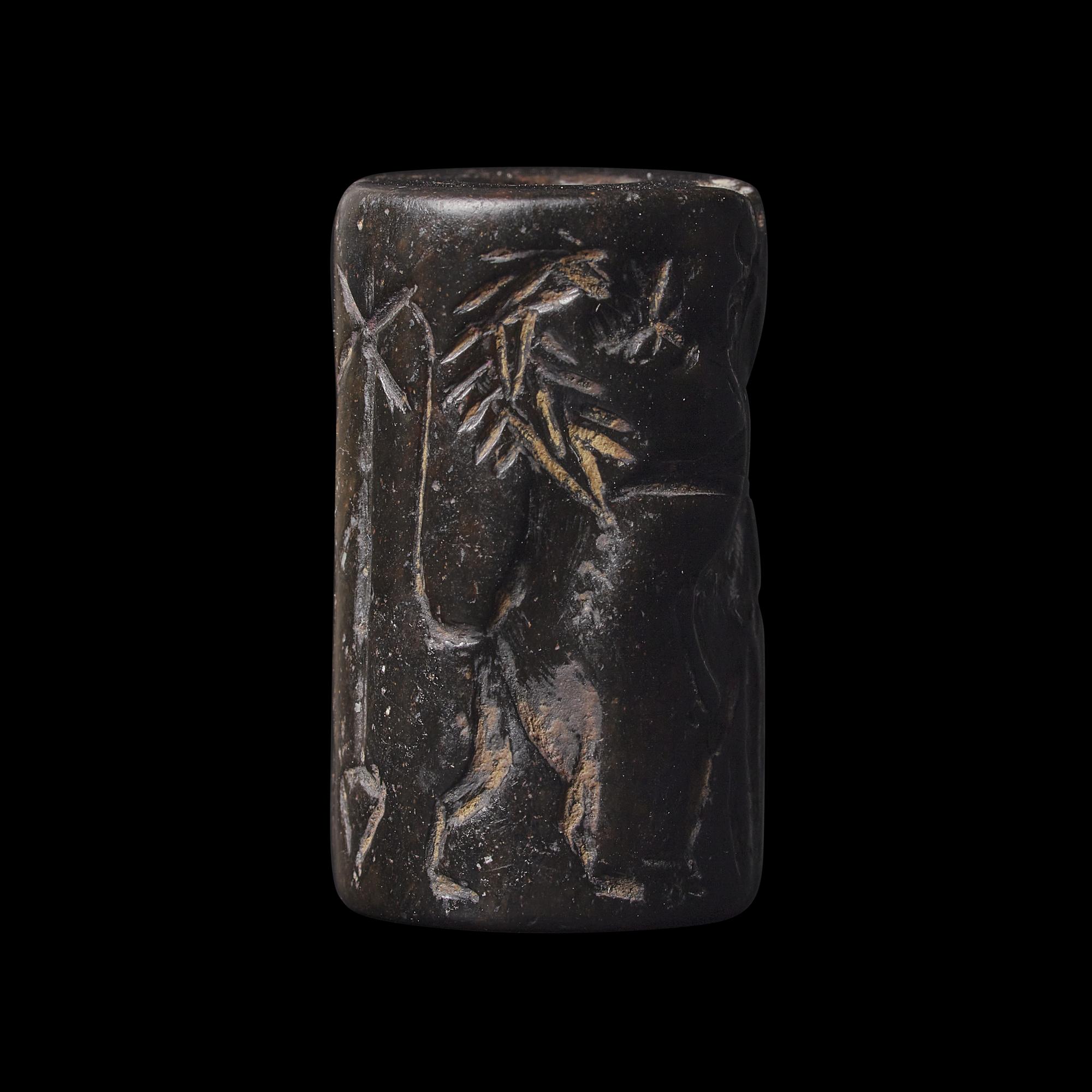 An Akkadian Hematite Cylinder Seal