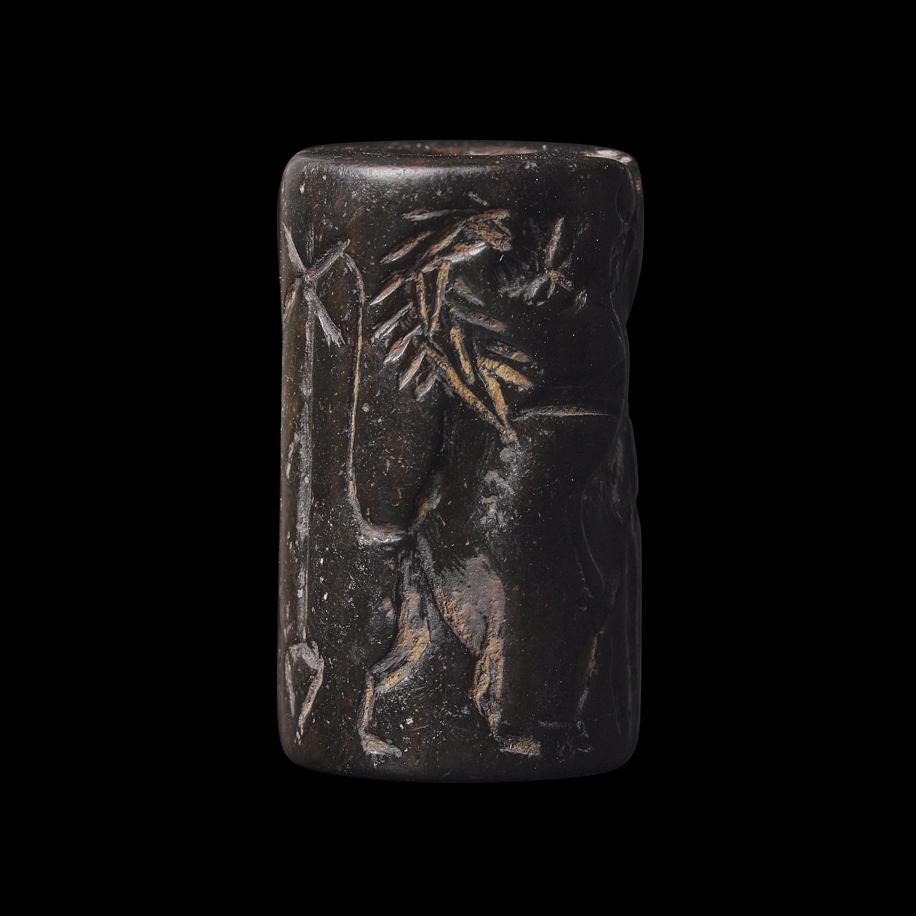 An Akkadian Hematite Cylinder Seal