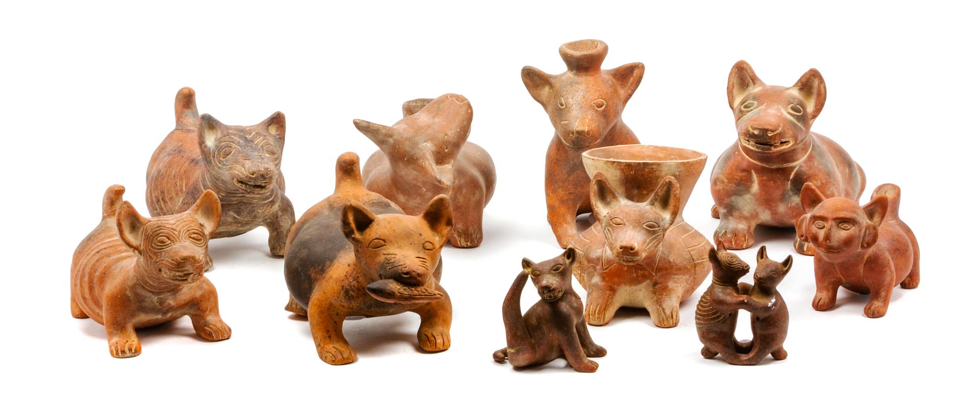 Ten Colima Mexican Terracotta Stylized Dog Vessels Width of widest 12 1/2 inches.