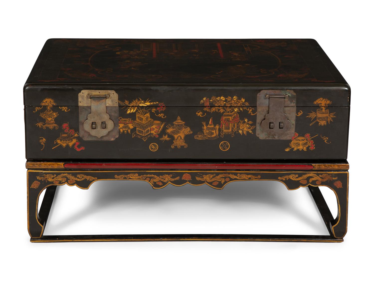 A Chinese Lacquered Trunk on Stand