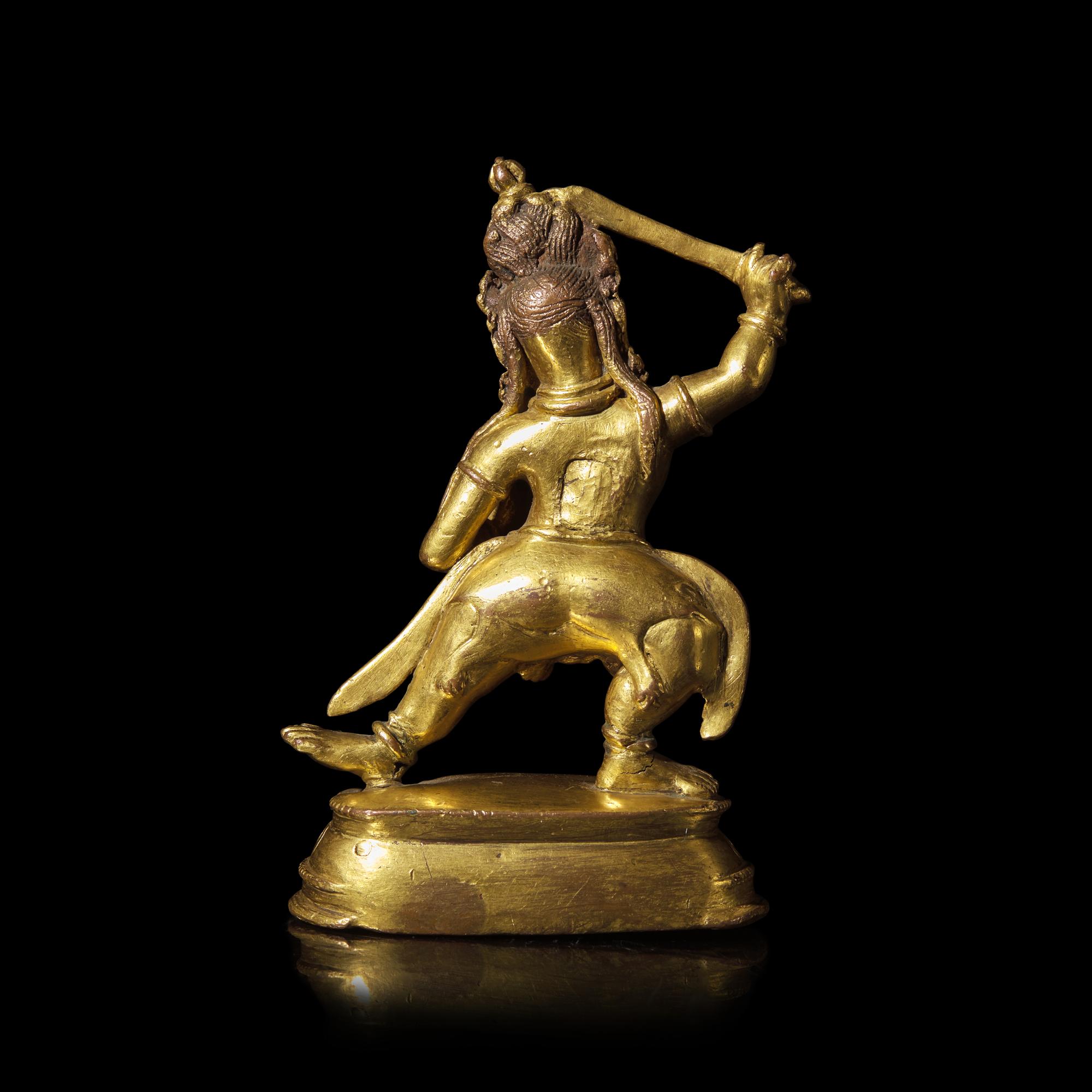 A Tibetan Gilt Bronze Figure of Mahakala, 16th/17th Century 十六/十七世紀 藏傳佛教銅鎏金大黑天