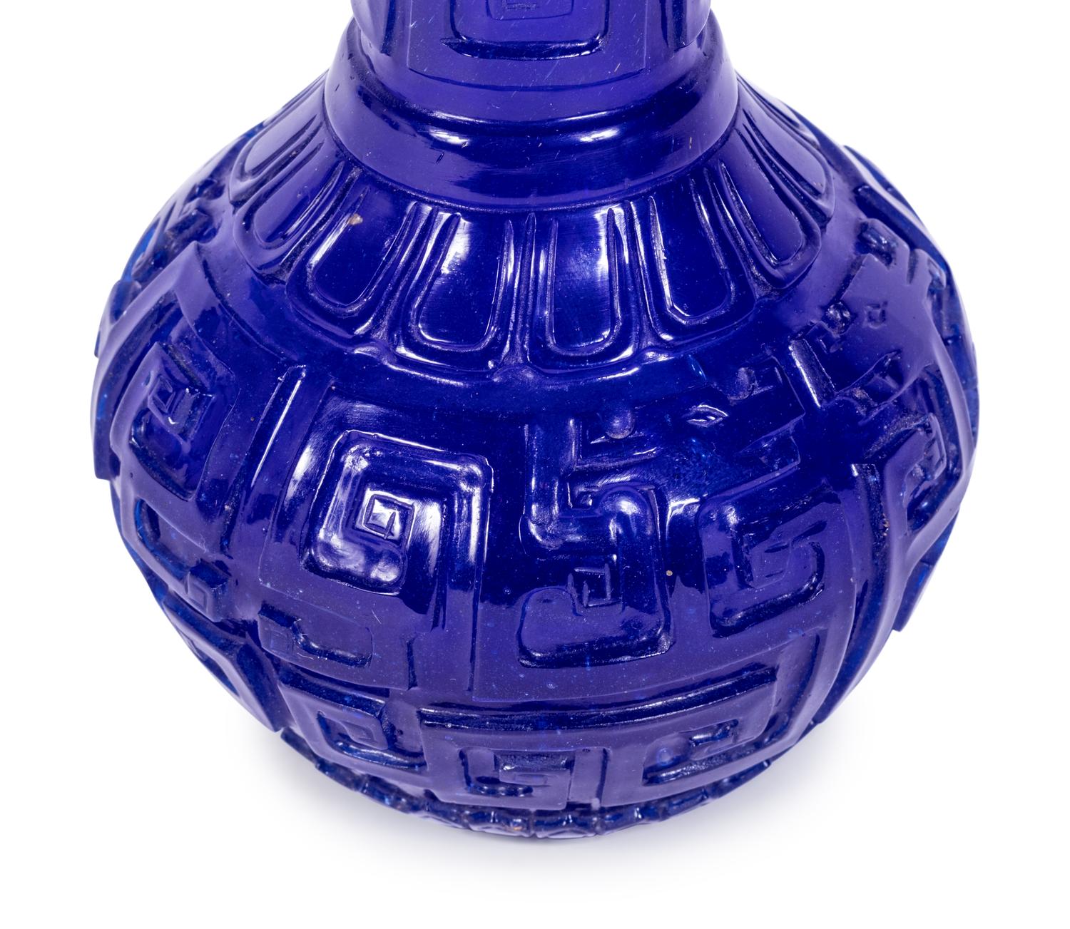 A Chinese Carved Transparent Sapphire Blue Glass Bottle Vase