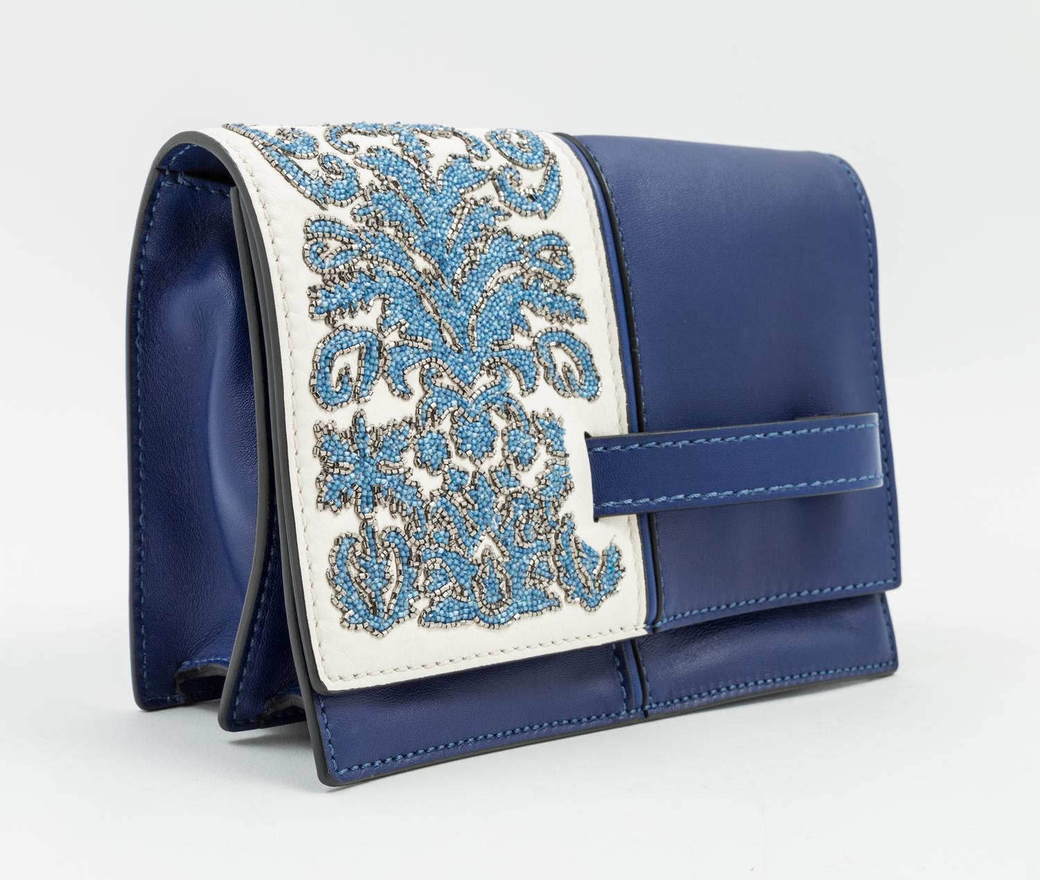 A Valentino Garavani Blue Leather Clutch, 9" x 7" x 3.25".
