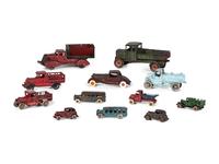 Twelve Painted Cast Iron Cars, Buses, and Trucks