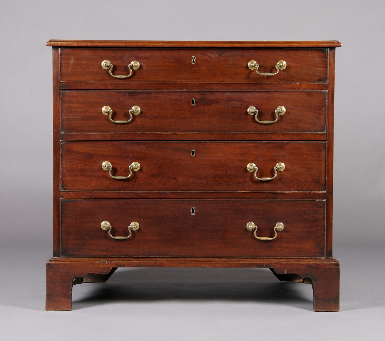 A George III Mahogany Chest of Drawers, Height 34 3/8 x width 36 1/4 x depth 21 inches.