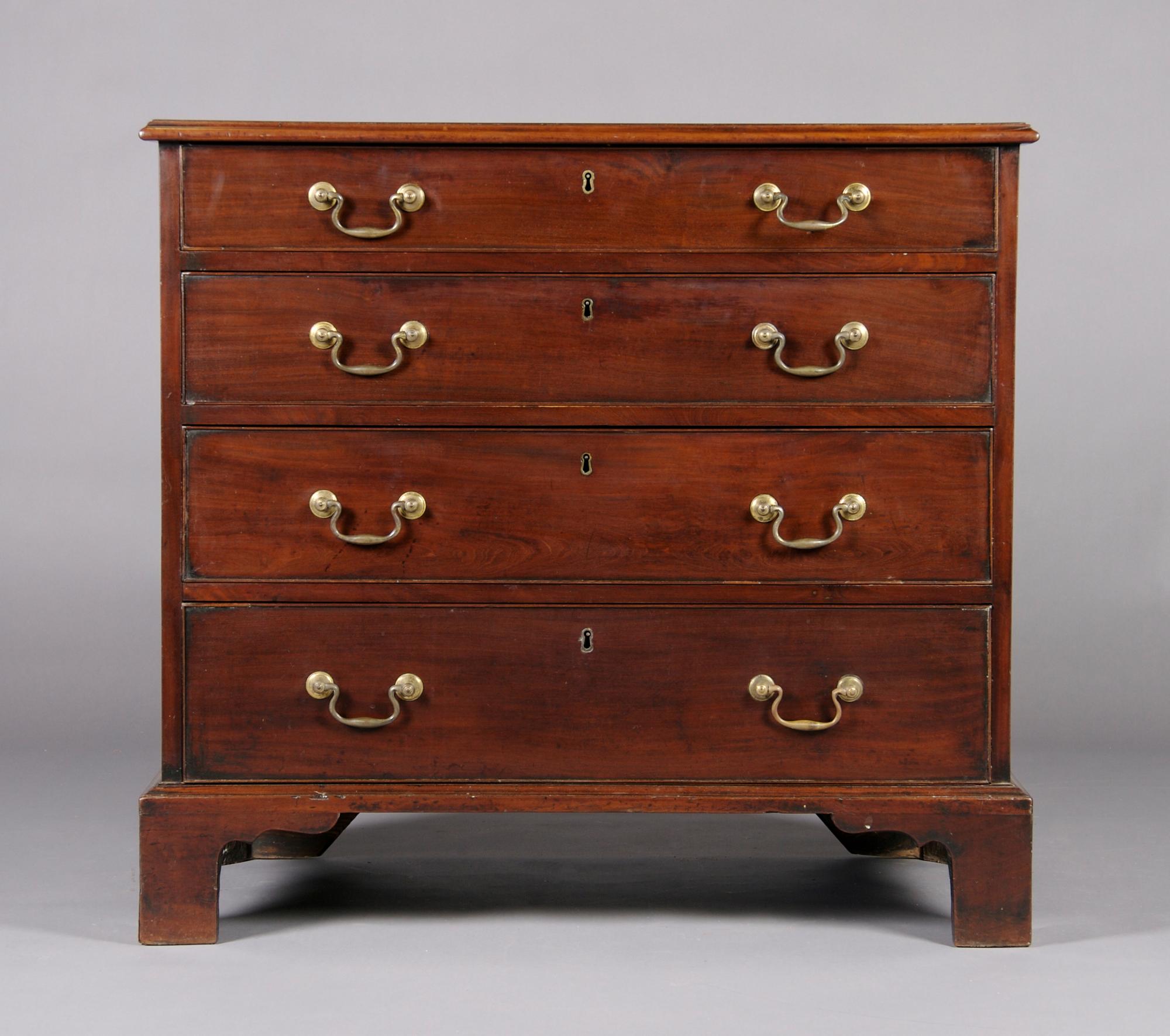 A George III Mahogany Chest of Drawers, Height 34 3/8 x width 36 1/4 x depth 21 inches.