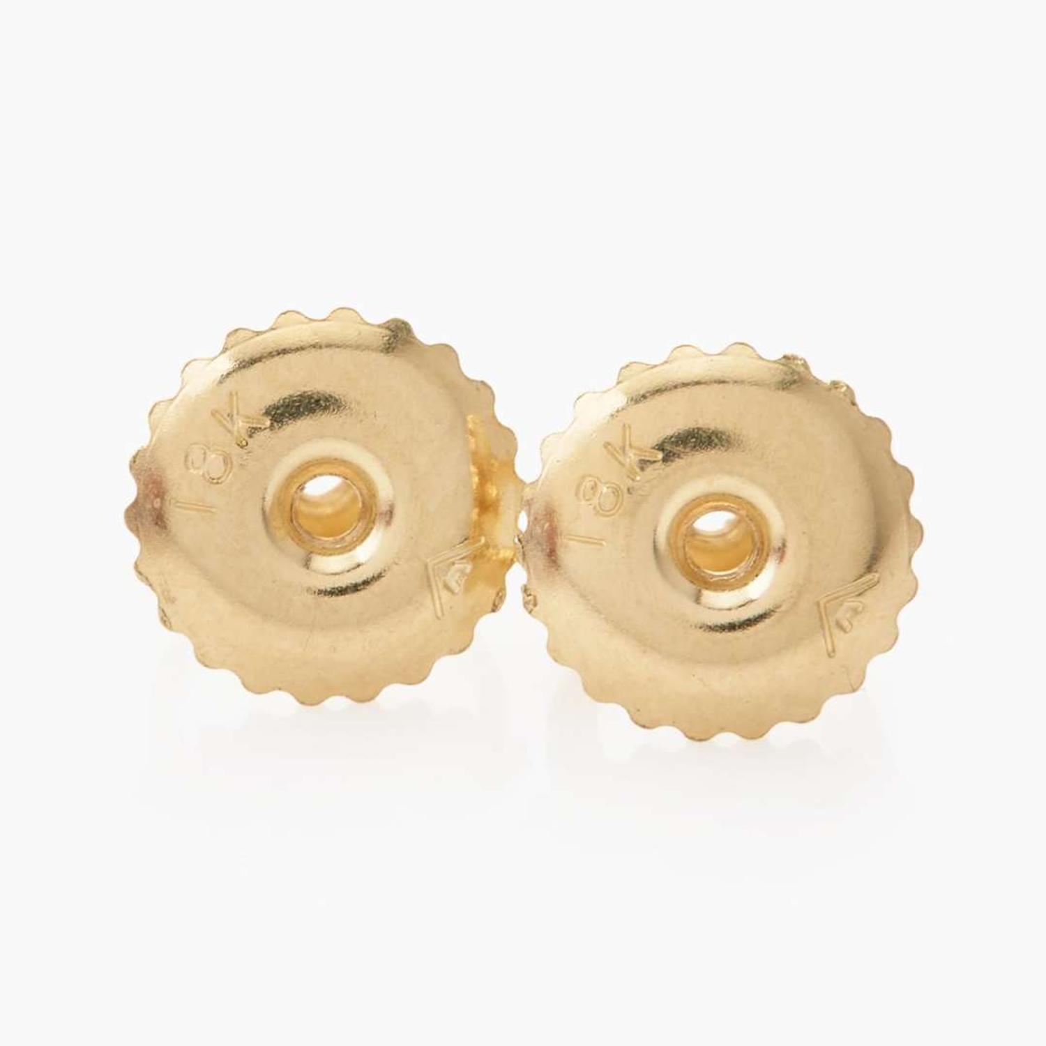 A Pair of 18K Gold, Ruby, and Diamond Earrings