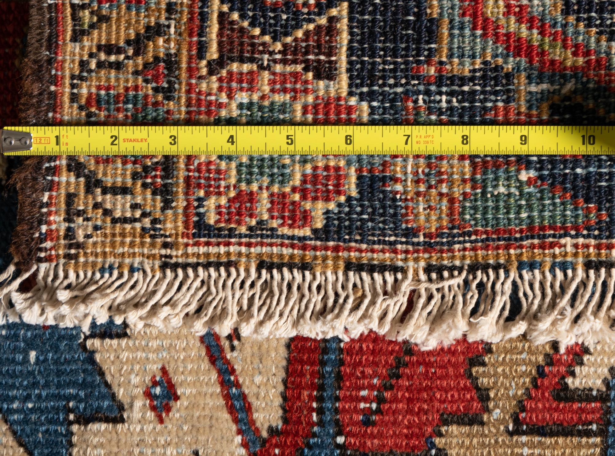 A Heriz Wool Rug