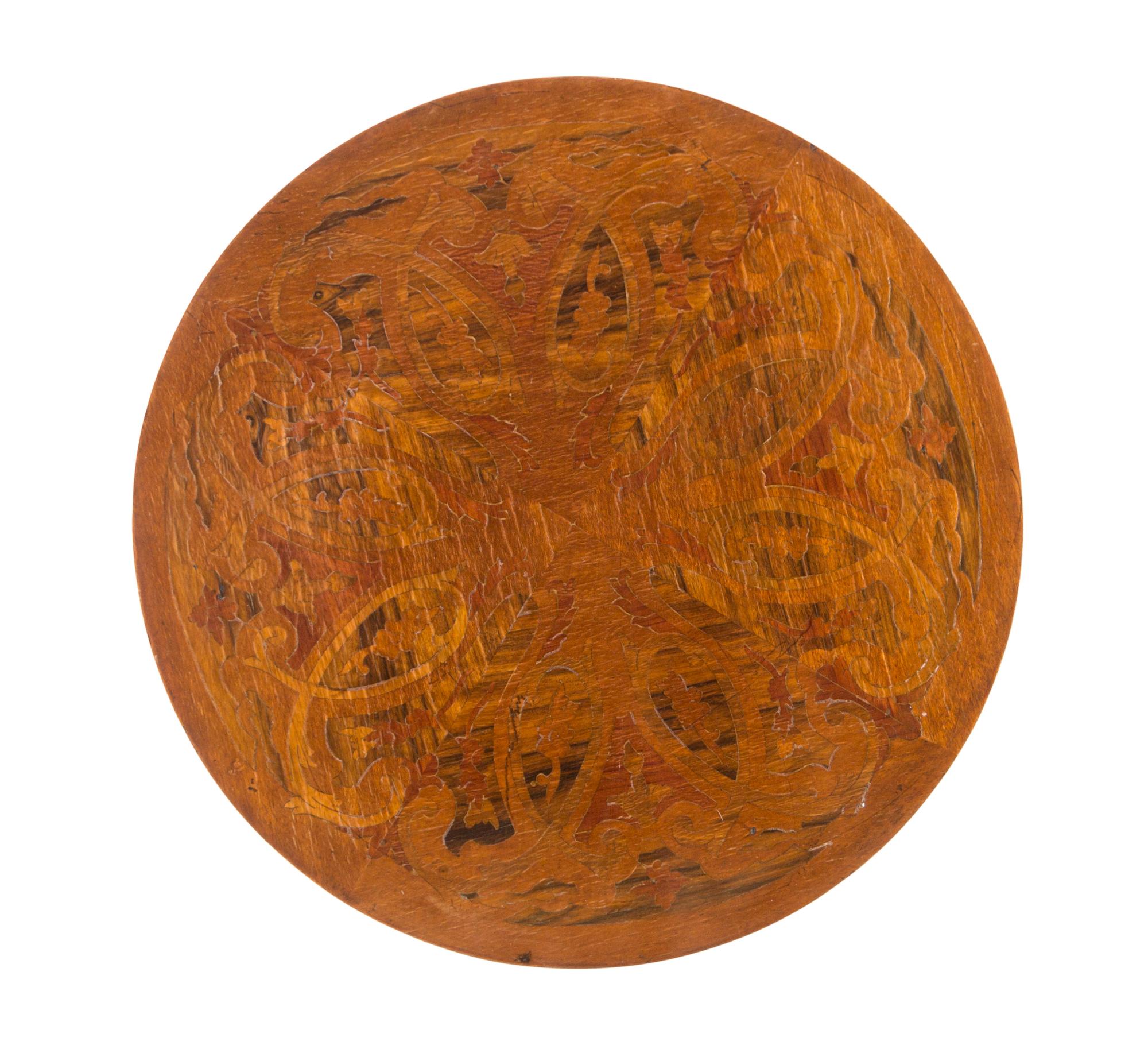 A Continental Marquetry Table Height 30 x diameter of top 17 1/2 inches. — LATE 19TH CENTURY