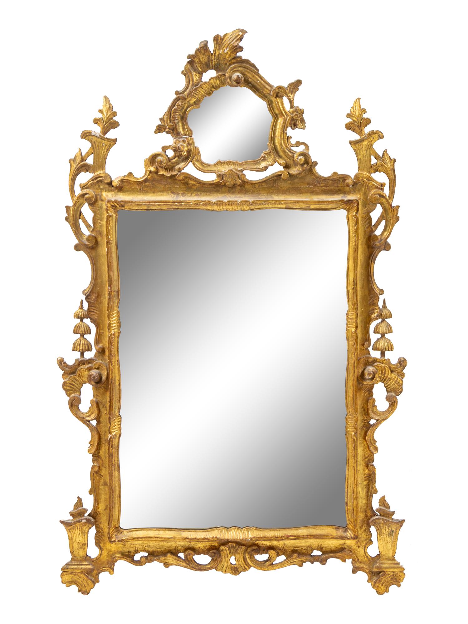 An Italian Baroque Style Giltwood Mirror