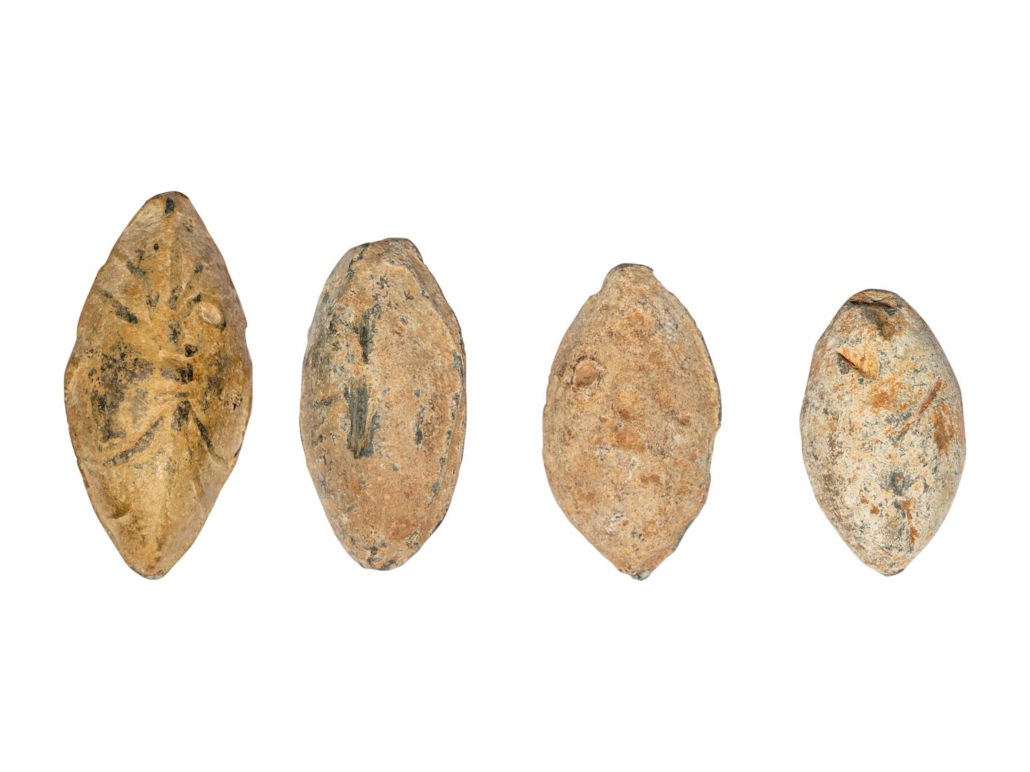 Four Roman Lead Slingshot Bullets