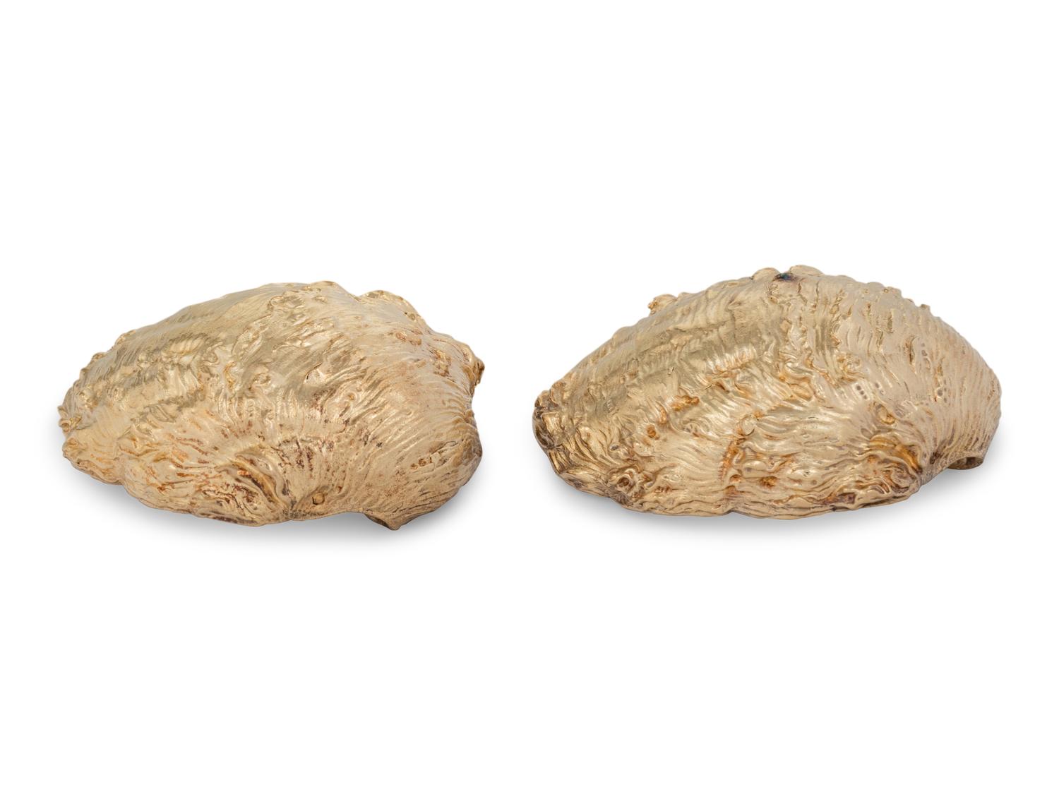 A Pair of French Parcel-Gilt Silver Shell-Form Salt Cellars