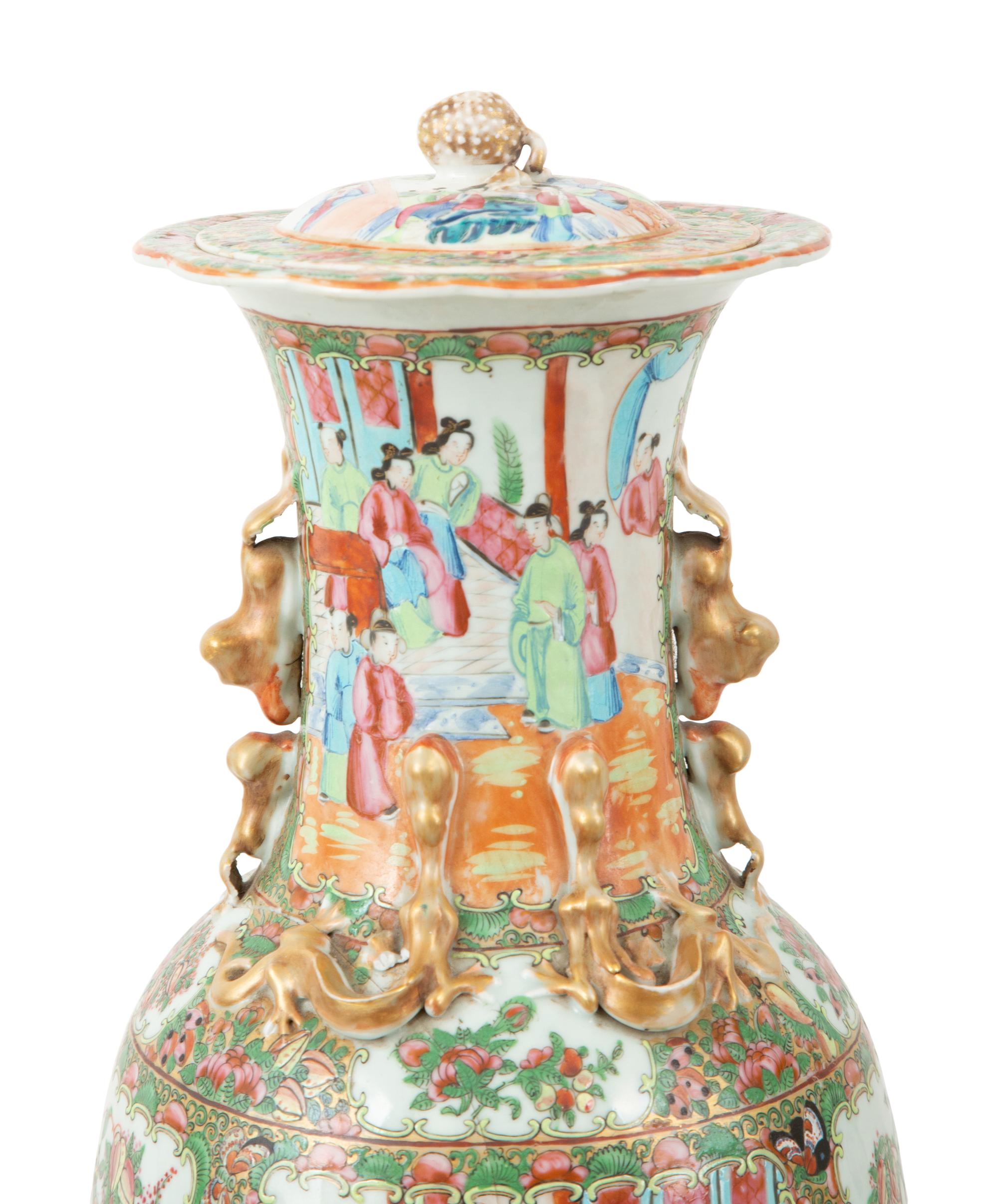 A Pair of Rose Medallion Porcelain Lidded Vases