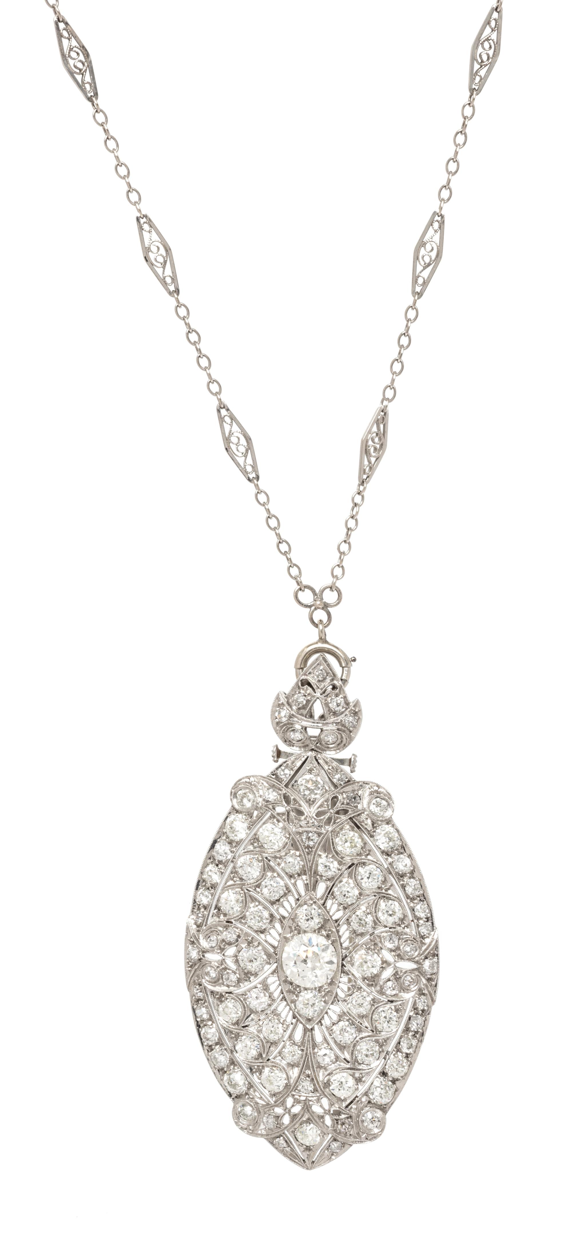 An Art Deco Platinum and Diamond Convertible Pendant/Brooch, 15.90 dwts.