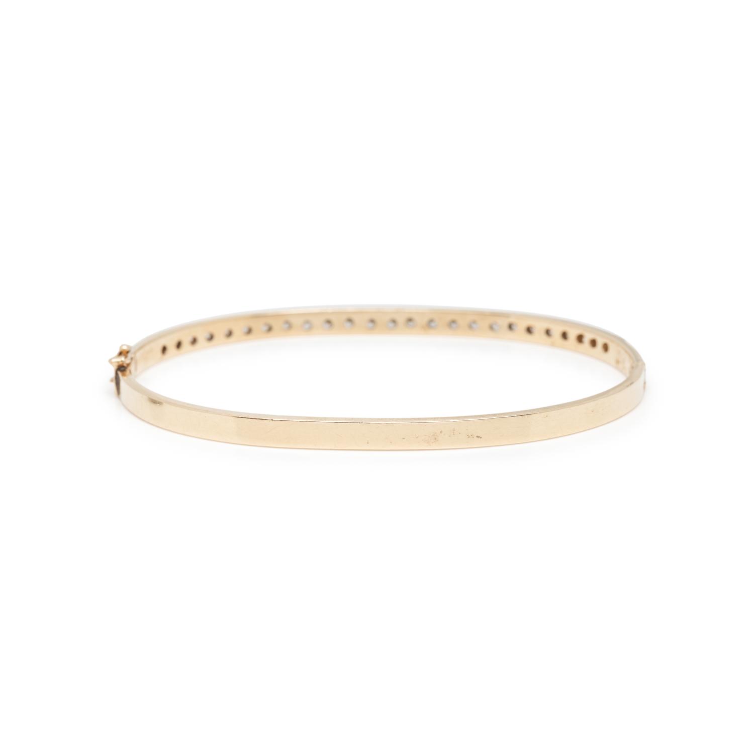 DIAMOND AND YELLOW GOLD BANGLE BRACELET
