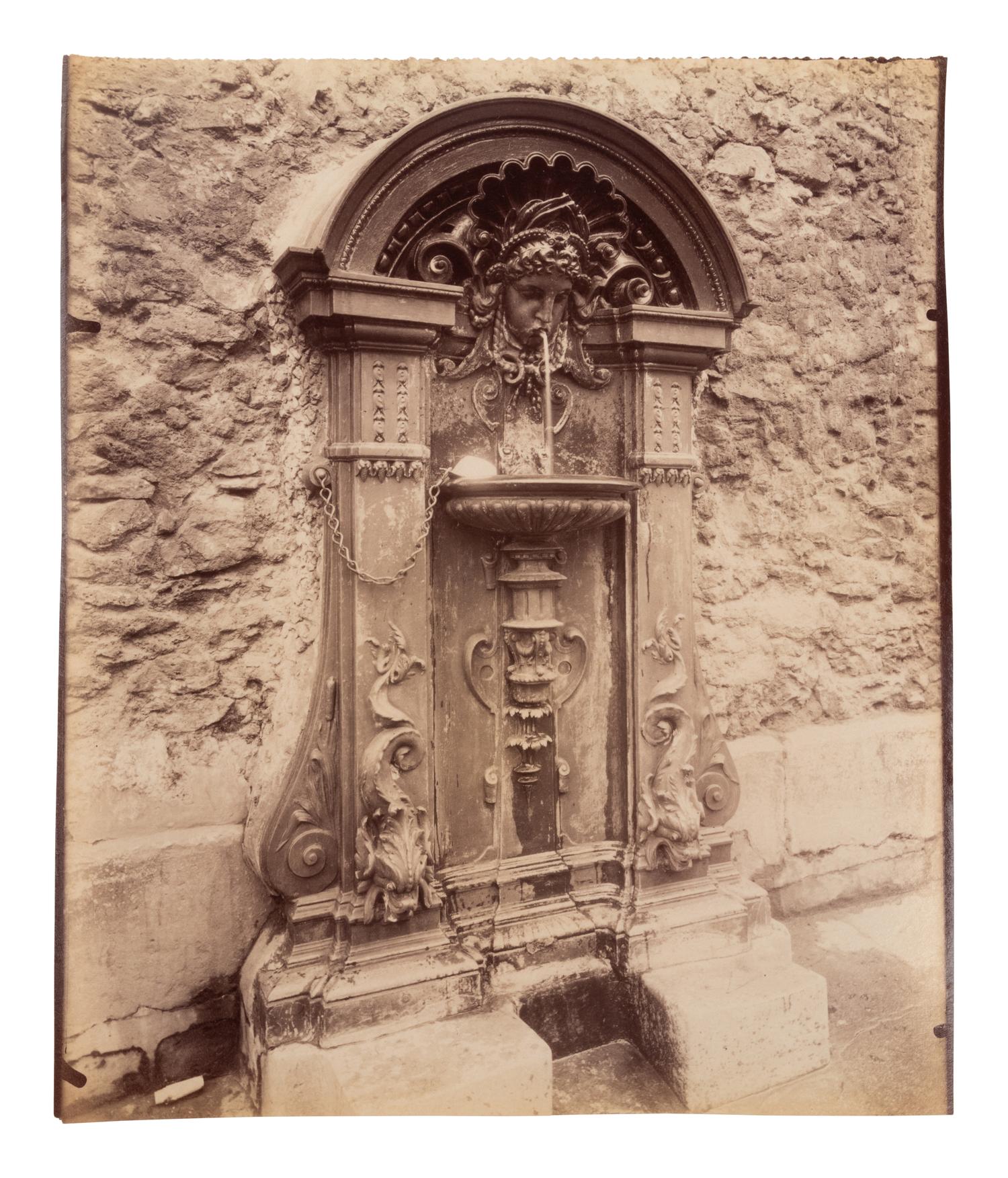 A pair of photographs depicting fountains ( Fontaine, rue Geoffrey Saint-Hilaire , 1905; Fontaine, faubourg Saint-Martin , 1912)