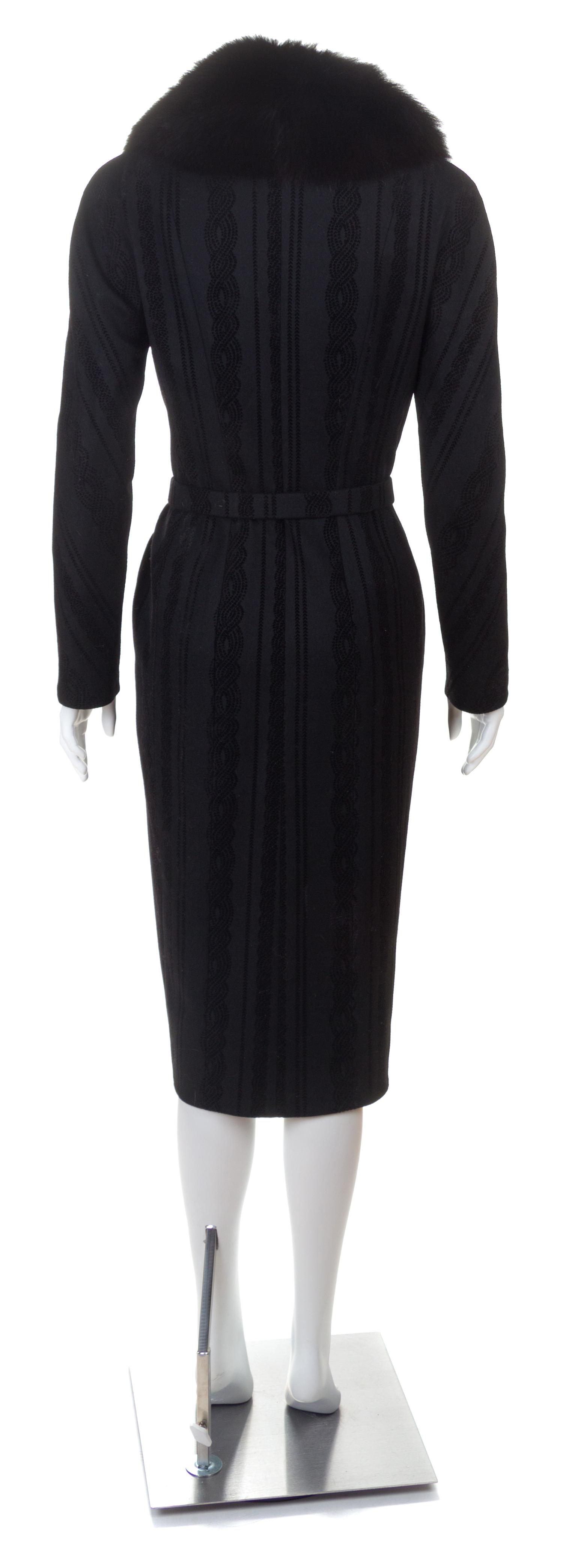 A Christian Dior Black Wool Coat with Fox Fur Trim, Size 6; Belt: 27"- 29" x 1".