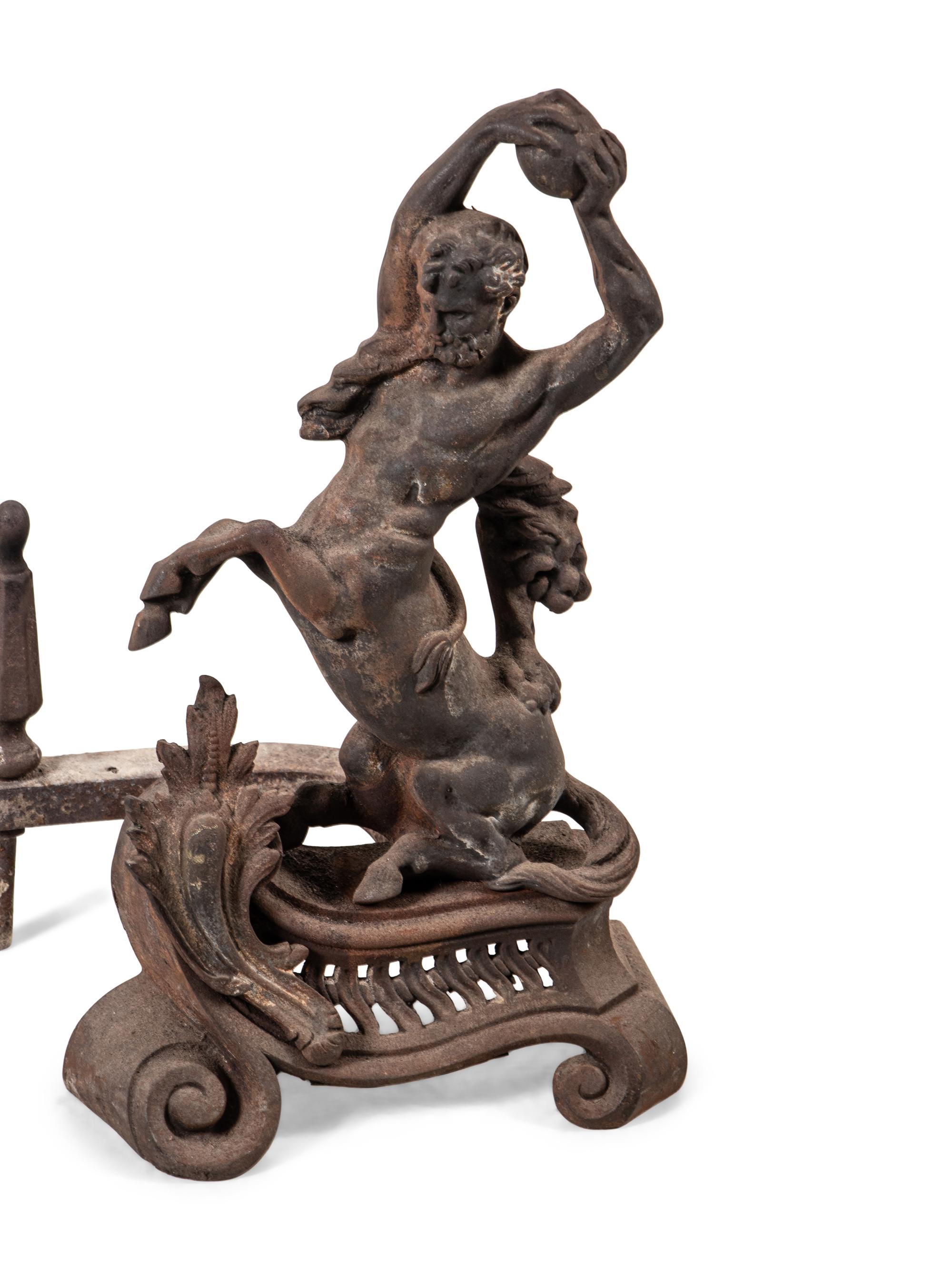 A Pair of Continental Iron Andirons with Hercules and the Nemean Lion
