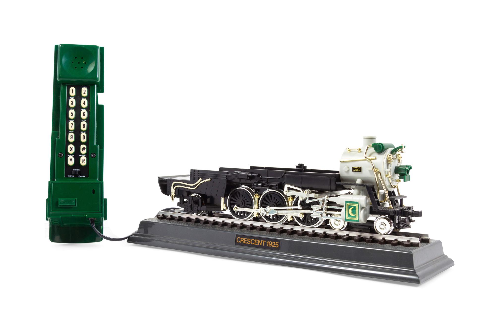 A Polychrome Resin Locomotive-Form Telephone — SECOND HALF 20TH CENTURY
