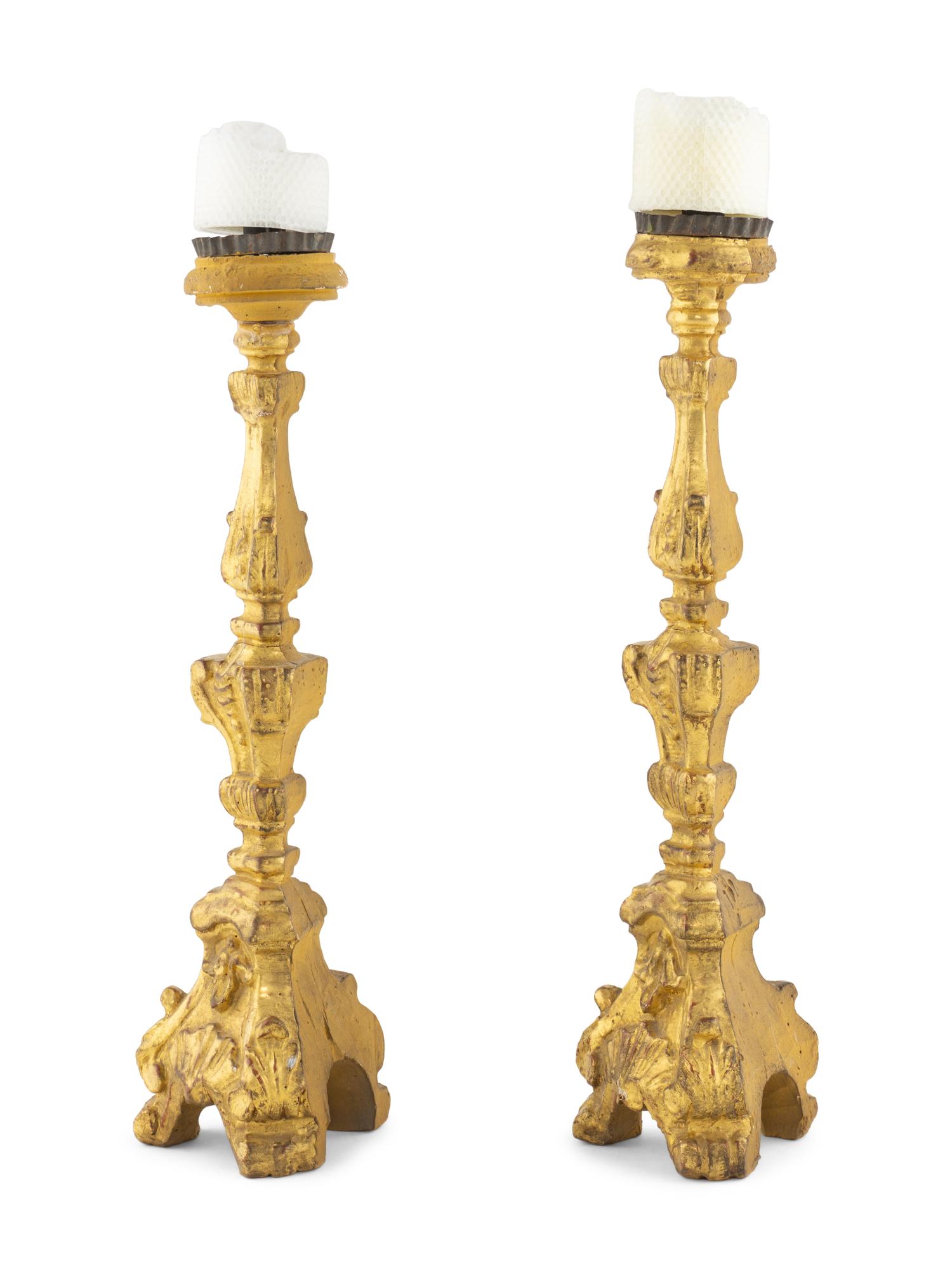 A Pair of Continental Giltwood Prickets