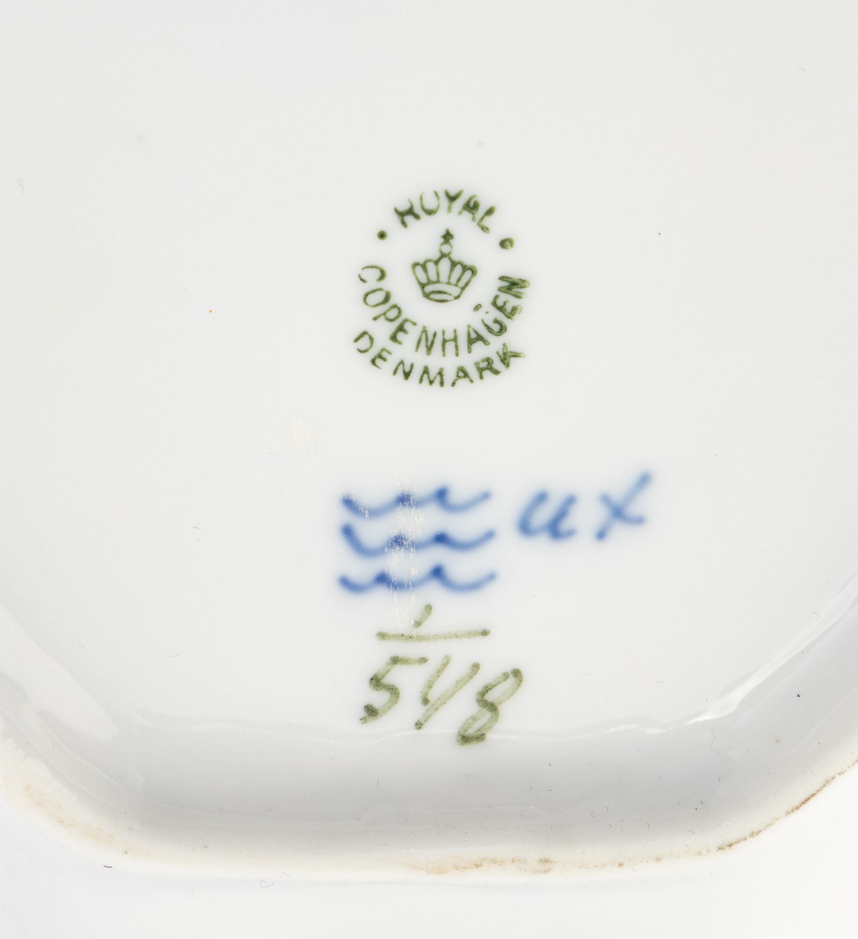 A Royal Copenhagen Blue Fluted Half Lace Porcelain Luncheon Service