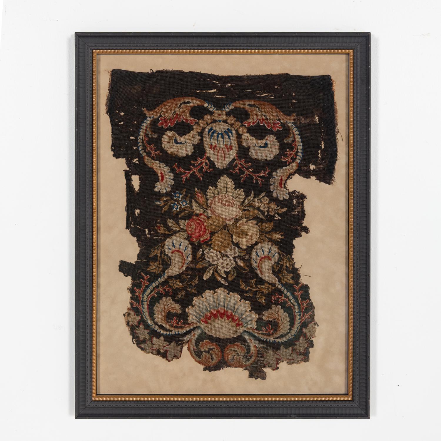 A Louis XIII Carved Walnut Fauteuil