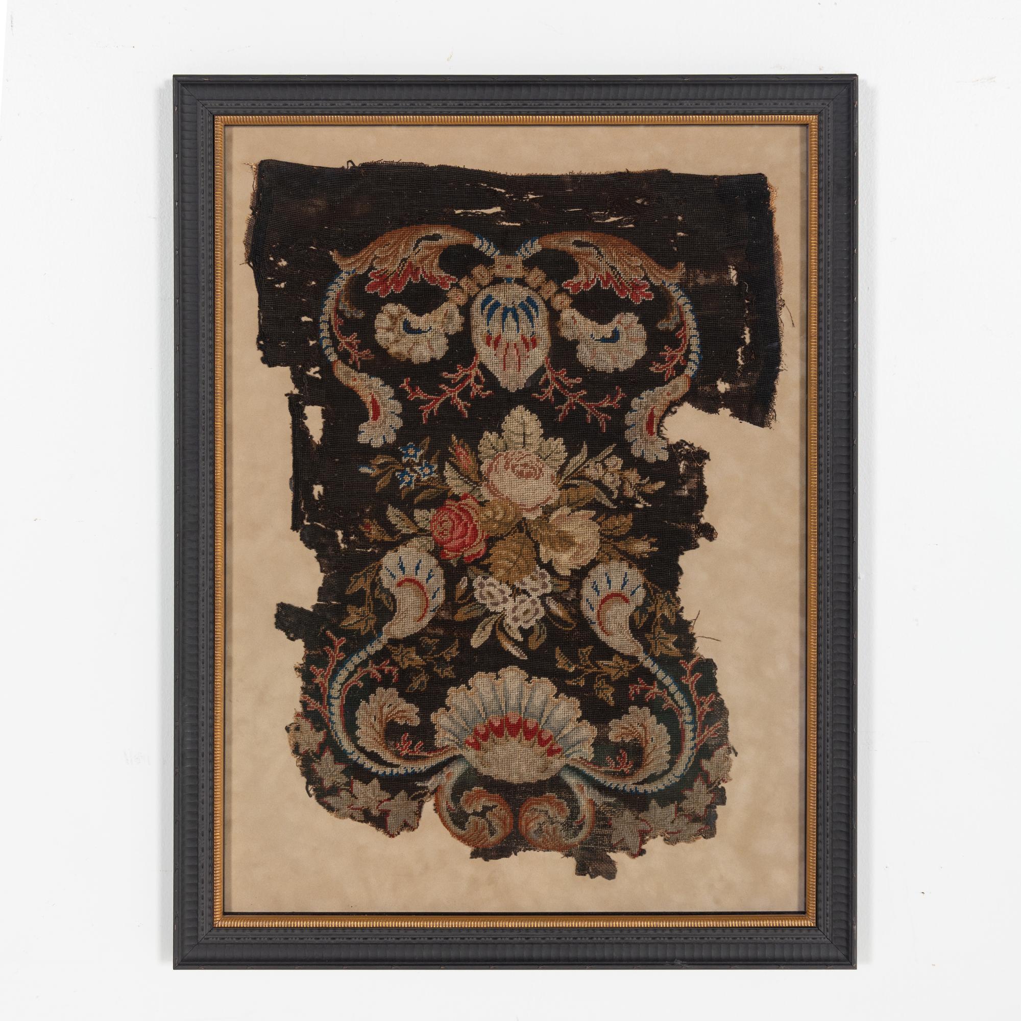 A Louis XIII Carved Walnut Fauteuil