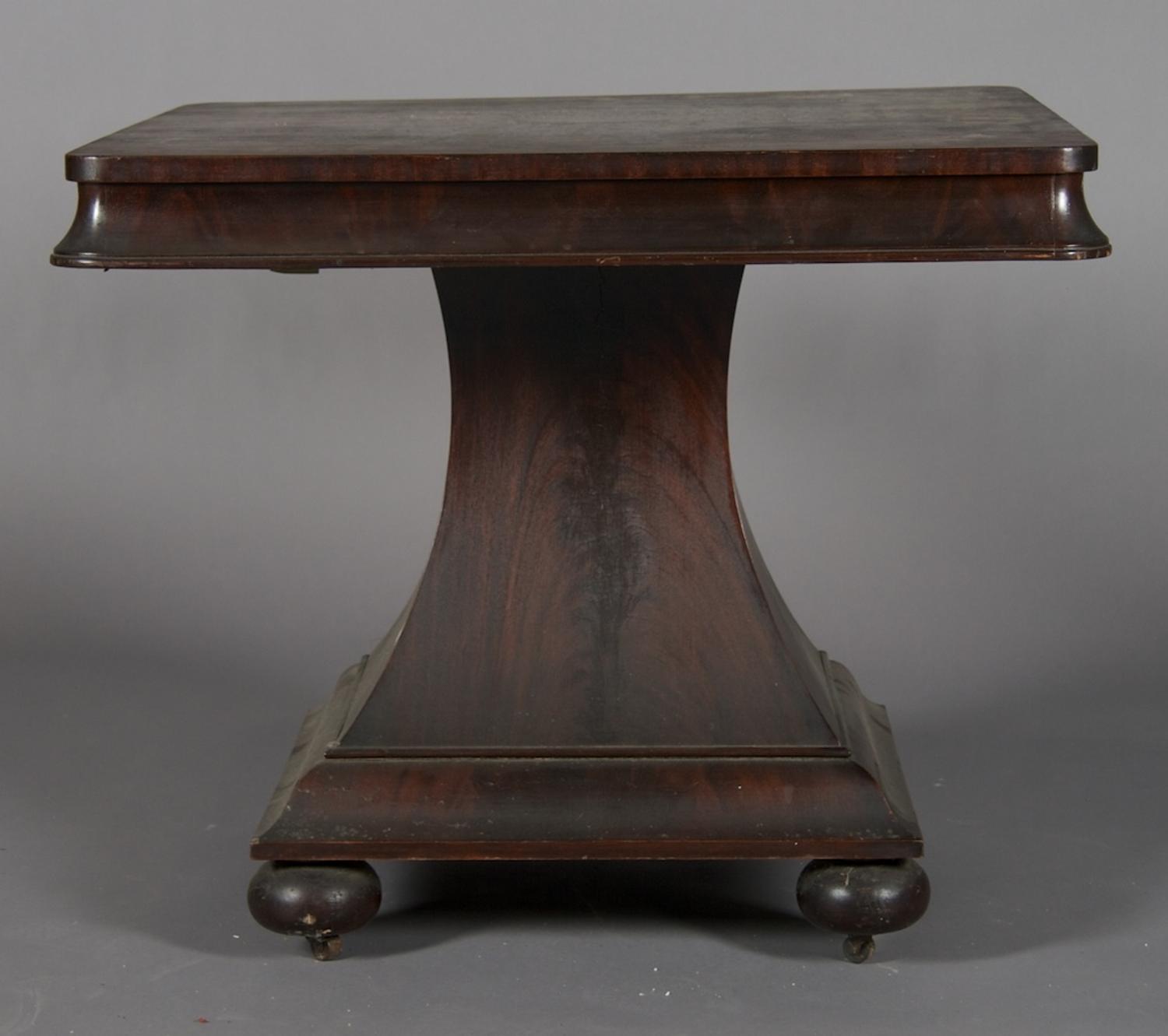 An American Empire Mahogany Center Table, Height 29 1/4 x width 34 x depth 34 inches.