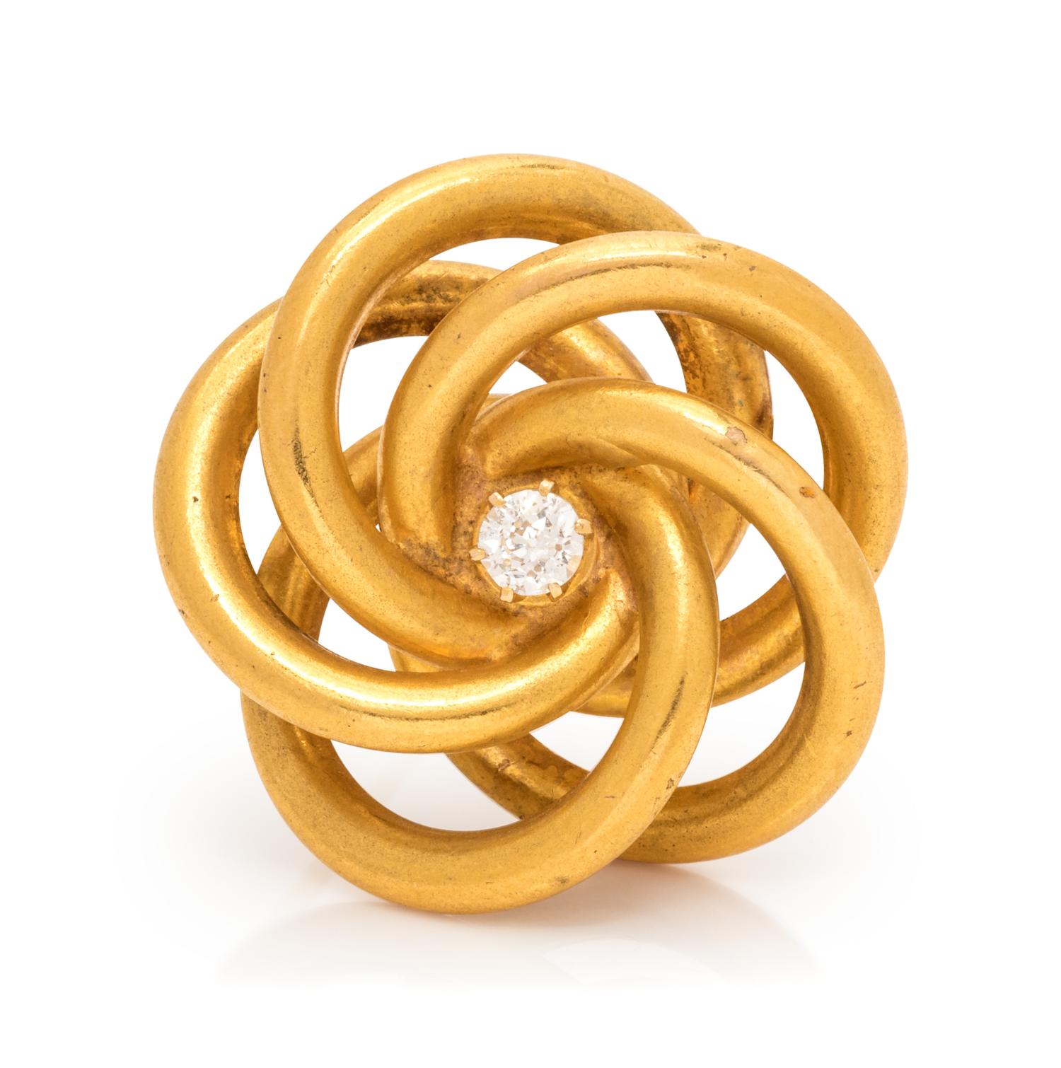 A 14 Karat Yellow Gold and Diamond Brooch,