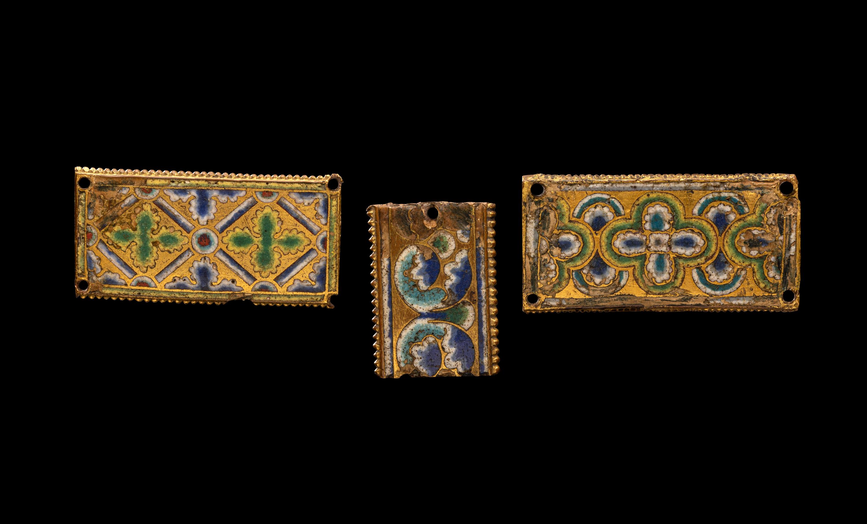 Three Rhenish Champlevé and Gilt Copper Framing Plaques