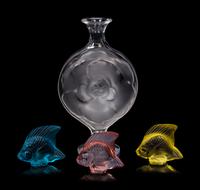 A Lalique Perfume Bottle and Three Lalique Fish