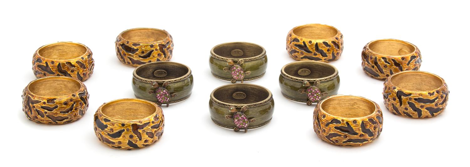 Two Sets of Jay Strongwater Enameled and Jeweled Napkin Rings — 20TH CENTURY
