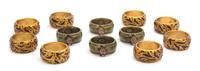 Two Sets of Jay Strongwater Enameled and Jeweled Napkin Rings — 20TH CENTURY