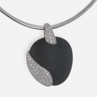 An 18K White Gold, Black Stone, and Diamond Necklace by Movado