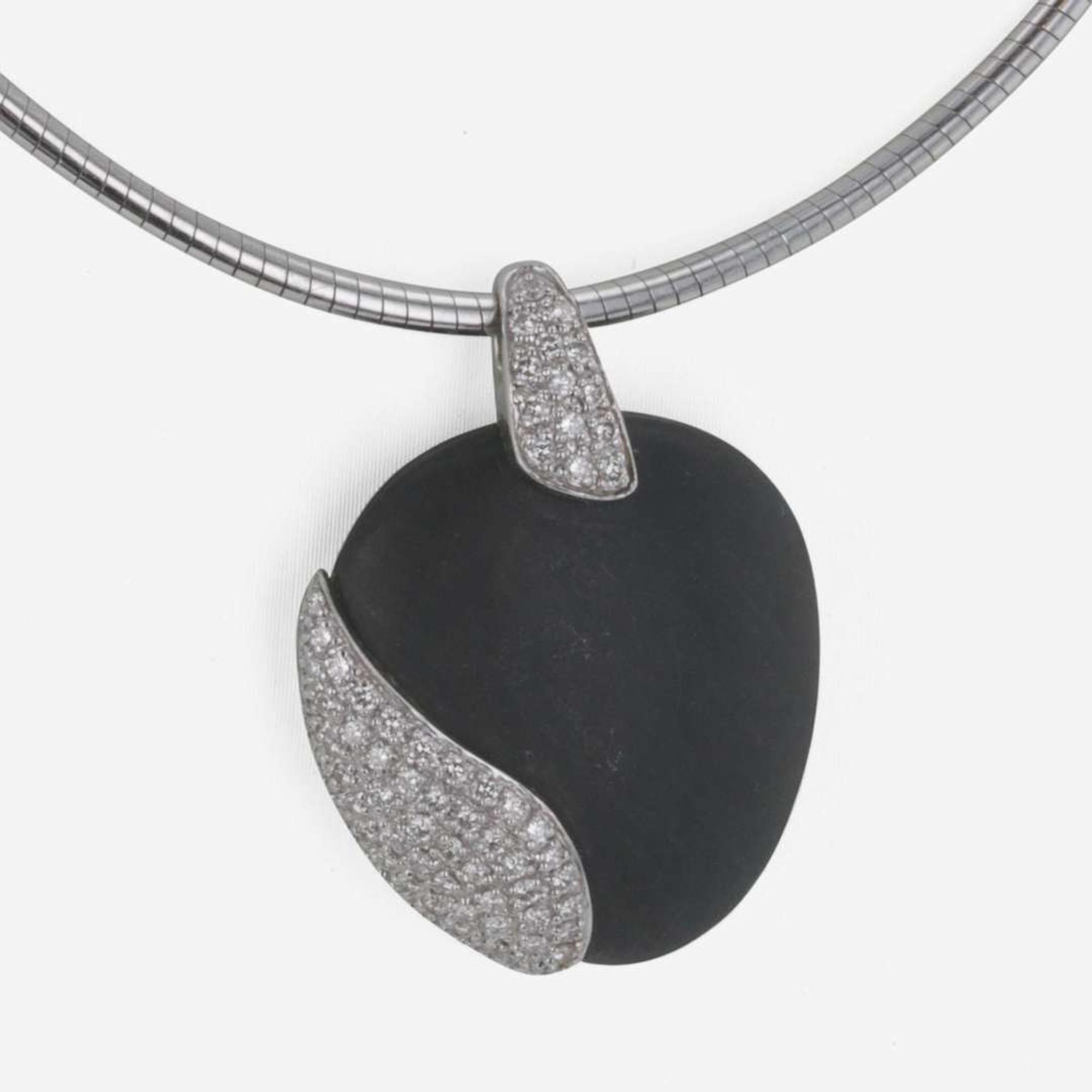 An 18K White Gold, Black Stone, and Diamond Necklace by Movado