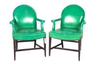 A Pair of Green Faux Leather Library Chairs Height 27 1/2 inches x width 26 inches x depth 17 7/8 inches.
