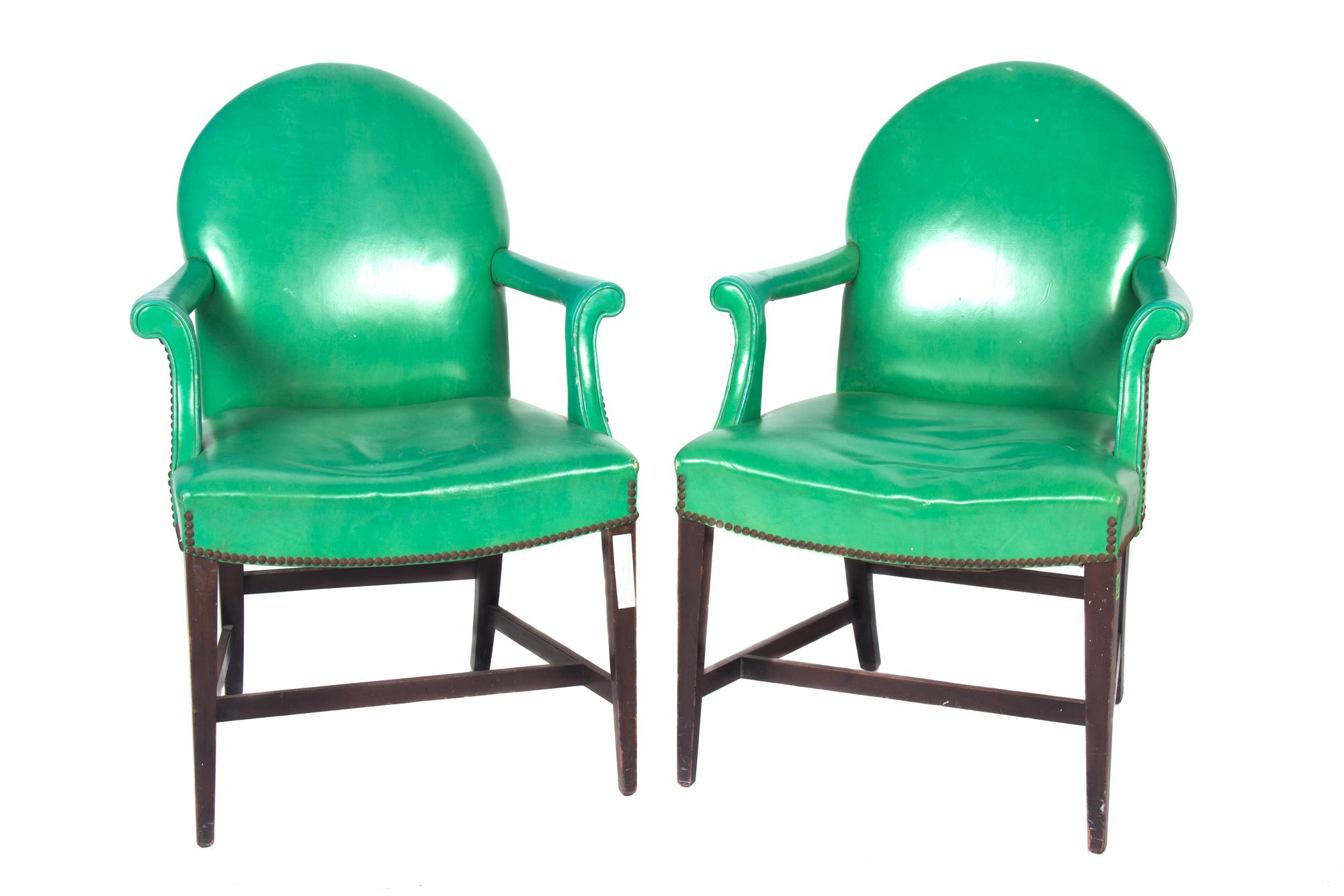 A Pair of Green Faux Leather Library Chairs Height 27 1/2 inches x width 26 inches x depth 17 7/8 inches.